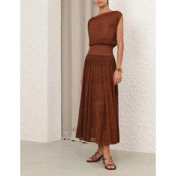 Elevate your elegance in this Zimmermann Tops available now at Coveti