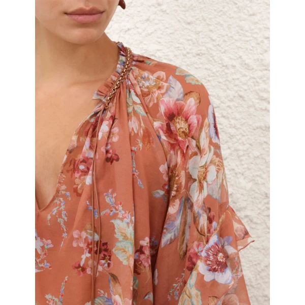 Elevate your elegance in this Zimmermann Tops available now at Coveti