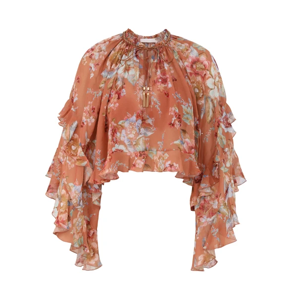 Elevate your elegance in this Zimmermann Tops available now at Coveti