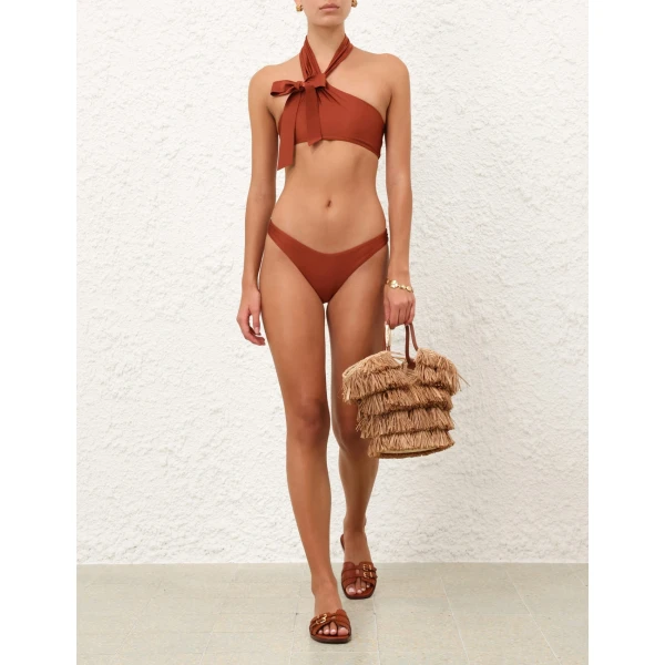 Elevate your elegance in this Zimmermann Bikini available now at Coveti