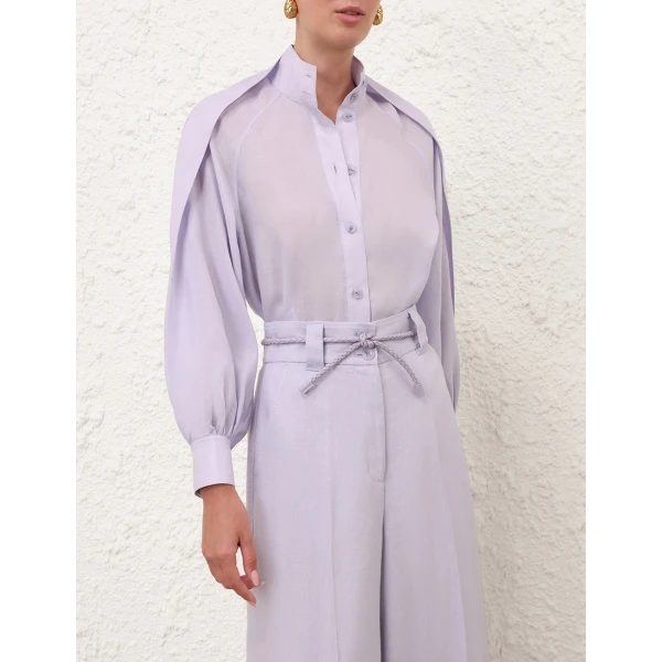 Elevate your elegance in this Zimmermann Tops available now at Coveti