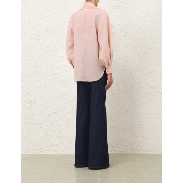Elevate your elegance in this Zimmermann Tops available now at Coveti
