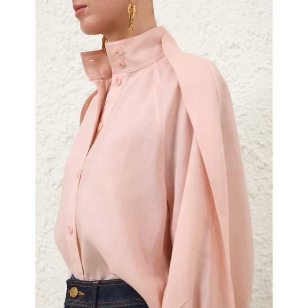 Elevate your elegance in this Zimmermann Tops available now at Coveti