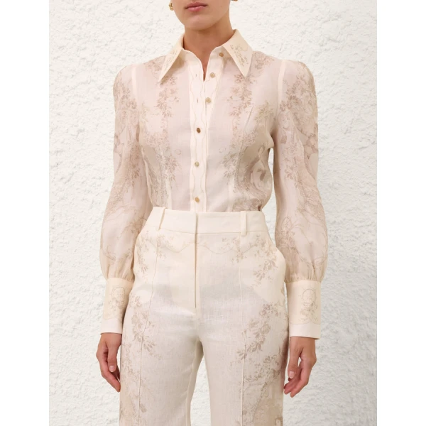 Elevate your elegance in this Zimmermann Tops available now at Coveti