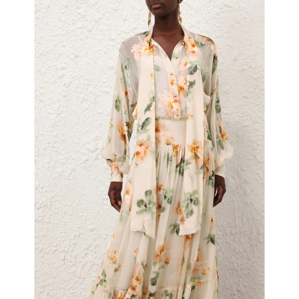Elevate your elegance in this Zimmermann Tops available now at Coveti