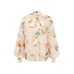 Elevate your elegance in this Zimmermann Tops available now at Coveti