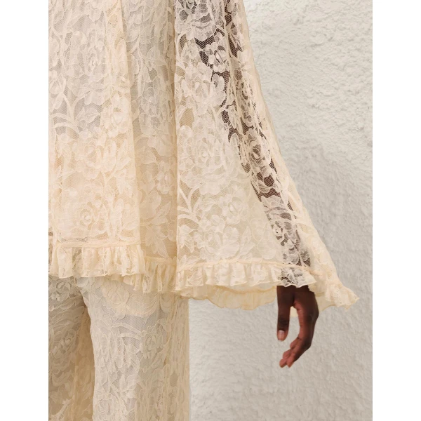Elevate your elegance in this Zimmermann Tops available now at Coveti