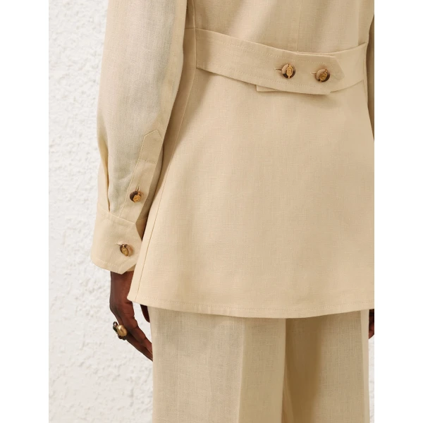 Elevate your elegance in this Zimmermann Tops available now at Coveti