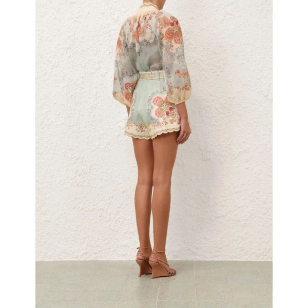 Elevate your elegance in this Zimmermann Tops available now at Coveti