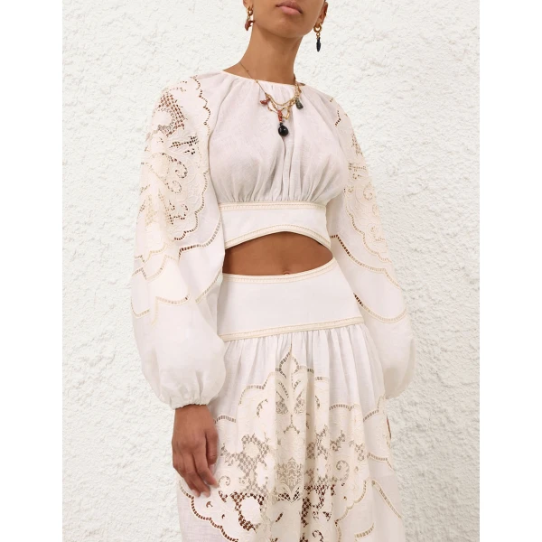 Elevate your elegance in this Zimmermann Tops available now at Coveti