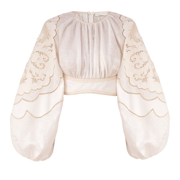Elevate your elegance in this Zimmermann Tops available now at Coveti