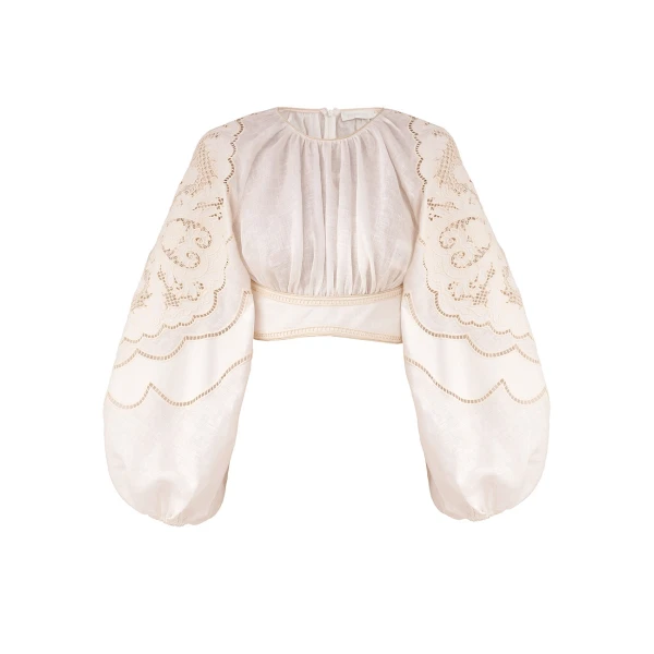 Elevate your elegance in this Zimmermann Tops available now at Coveti