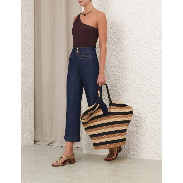 Elevate your elegance in this Zimmermann Tops available now at Coveti