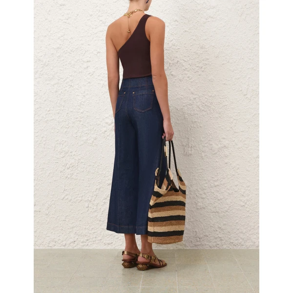 Elevate your elegance in this Zimmermann Tops available now at Coveti