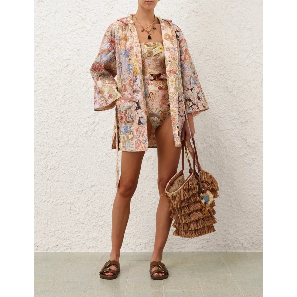 Elevate your elegance in this Zimmermann Robes available now at Coveti