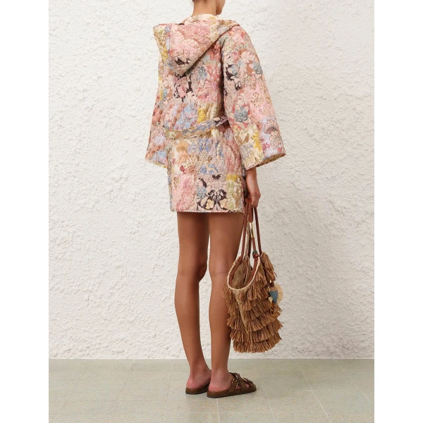 Elevate your elegance in this Zimmermann Robes available now at Coveti