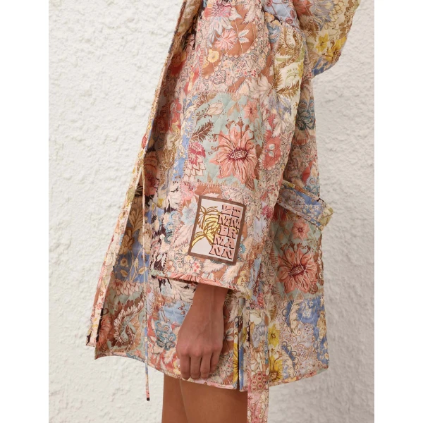 Elevate your elegance in this Zimmermann Robes available now at Coveti