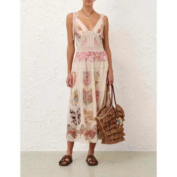 Elevate your elegance in this Zimmermann Dresses available now at Coveti