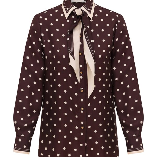 Elevate your elegance in this Zimmermann Tops available now at Coveti