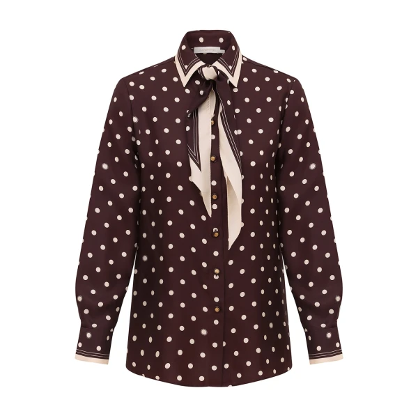 Elevate your elegance in this Zimmermann Tops available now at Coveti