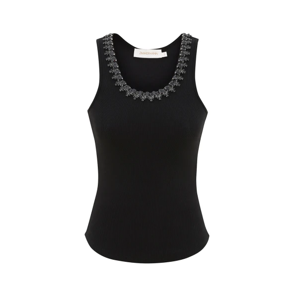 Elevate your elegance in this Zimmermann Tops available now at Coveti