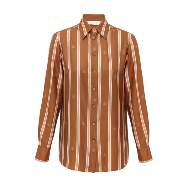 Elevate your elegance in this Zimmermann Tops available now at Coveti