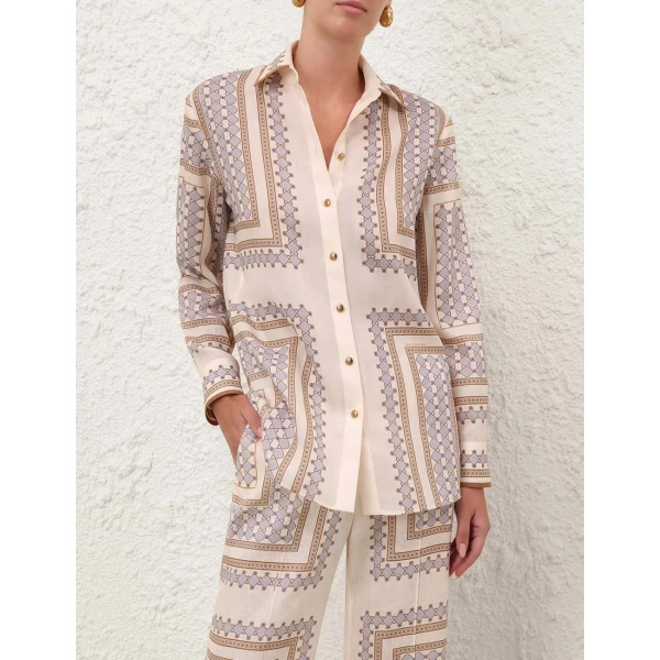 Elevate your elegance in this Zimmermann Tops available now at Coveti