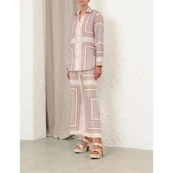 Elevate your elegance in this Zimmermann Tops available now at Coveti