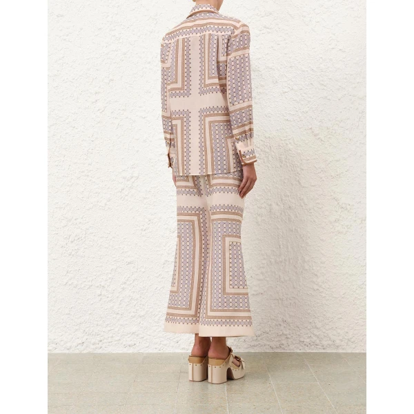 Elevate your elegance in this Zimmermann Tops available now at Coveti