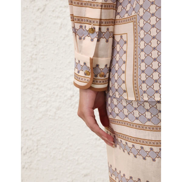 Elevate your elegance in this Zimmermann Tops available now at Coveti