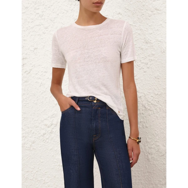 Elevate your elegance in this Zimmermann Tops available now at Coveti