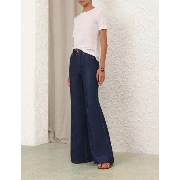 Elevate your elegance in this Zimmermann Tops available now at Coveti