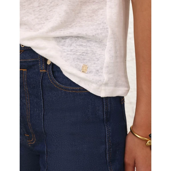 Elevate your elegance in this Zimmermann Tops available now at Coveti