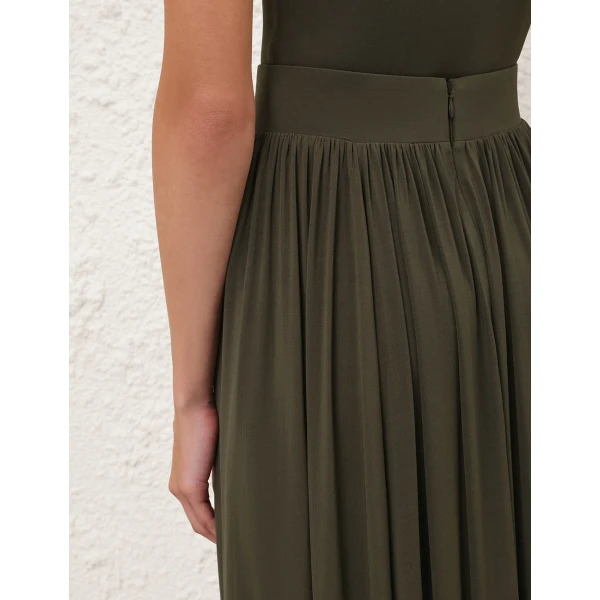 Elevate your elegance in this Zimmermann Skirts available now at Coveti
