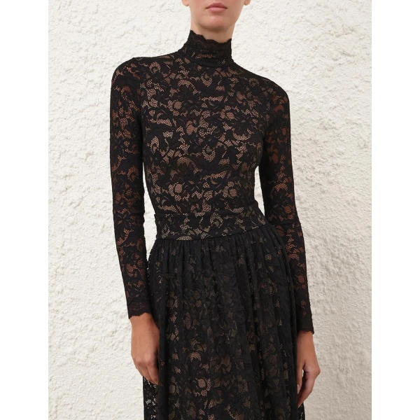 Elevate your elegance in this Zimmermann Tops available now at Coveti