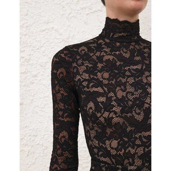 Elevate your elegance in this Zimmermann Tops available now at Coveti