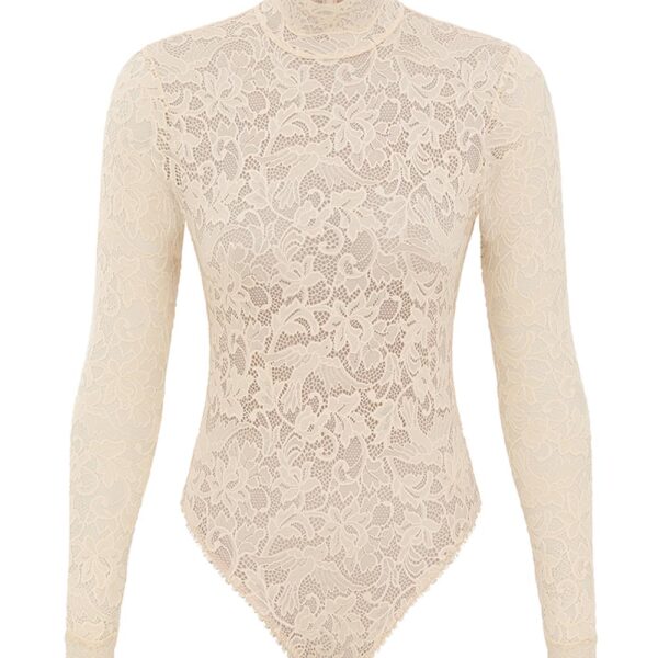 Elevate your elegance in this Zimmermann Tops available now at Coveti