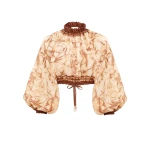 Elevate your elegance in this Zimmermann Tops available now at Coveti