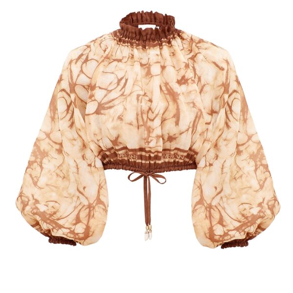 Elevate your elegance in this Zimmermann Tops available now at Coveti