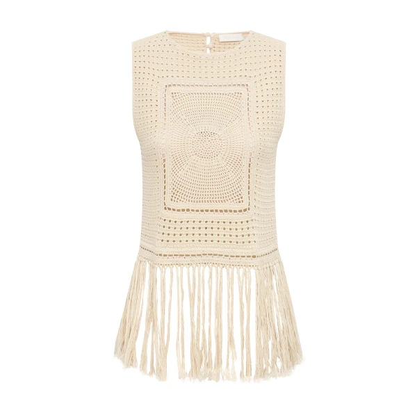 Elevate your elegance in this Zimmermann Tops available now at Coveti