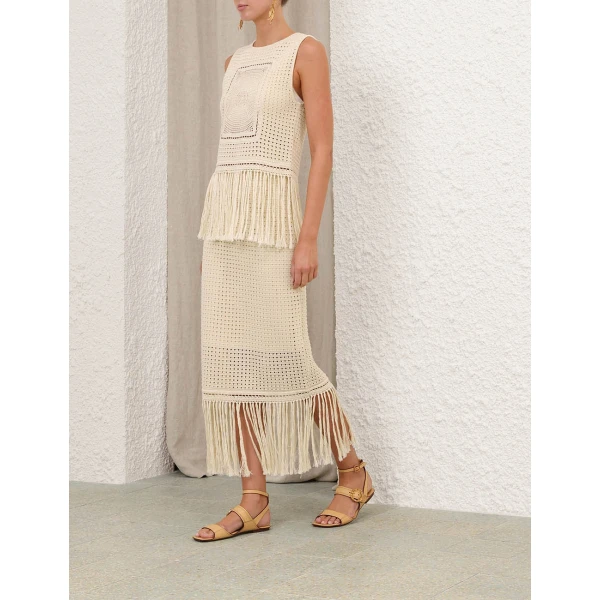 Elevate your elegance in this Zimmermann Skirts available now at Coveti