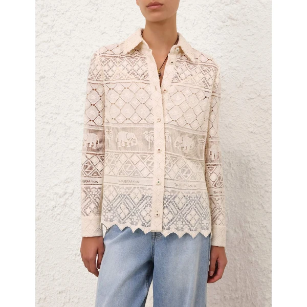 Elevate your elegance in this Zimmermann Tops available now at Coveti