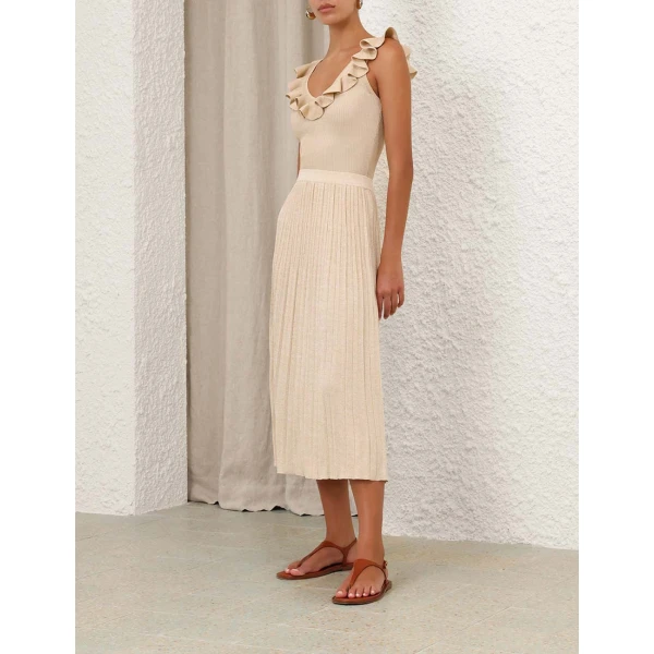 Elevate your elegance in this Zimmermann Tops available now at Coveti