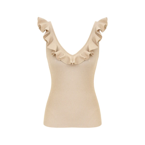 Elevate your elegance in this Zimmermann Tops available now at Coveti