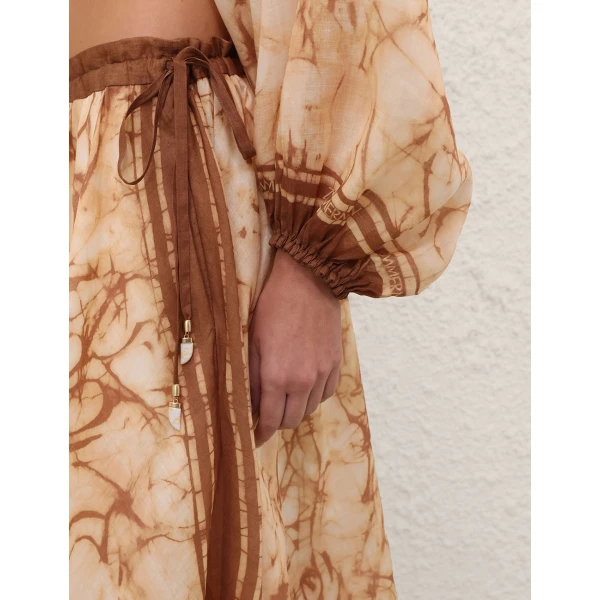 Elevate your elegance in this Zimmermann Skirts available now at Coveti