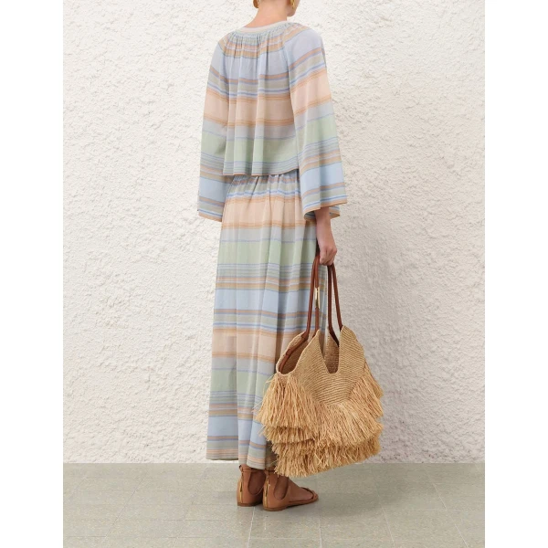 Elevate your elegance in this Zimmermann Tops available now at Coveti