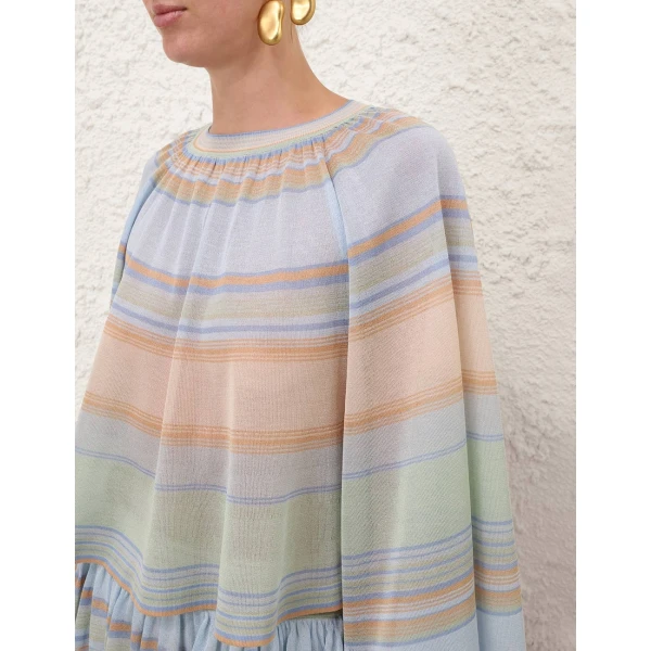 Elevate your elegance in this Zimmermann Tops available now at Coveti