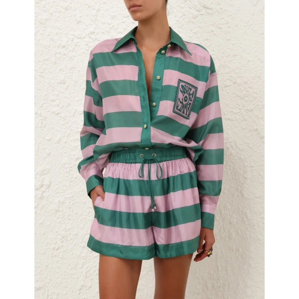 Elevate your elegance in this Zimmermann Tops available now at Coveti