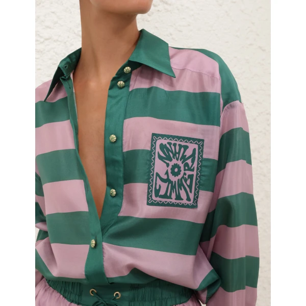 Elevate your elegance in this Zimmermann Tops available now at Coveti