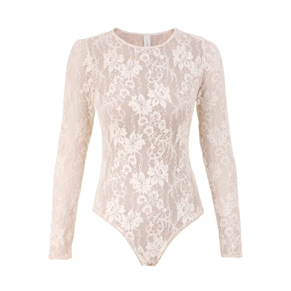 Elevate your elegance in this Zimmermann Tops available now at Coveti